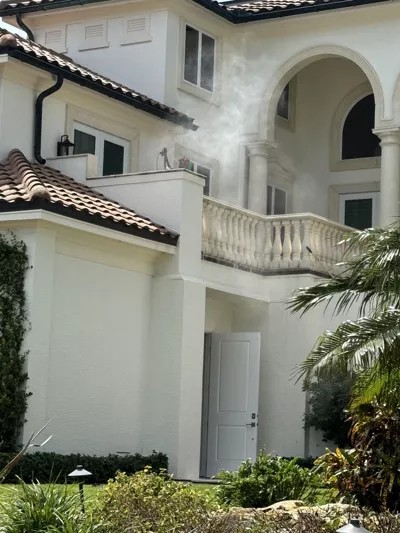 pressure washing house